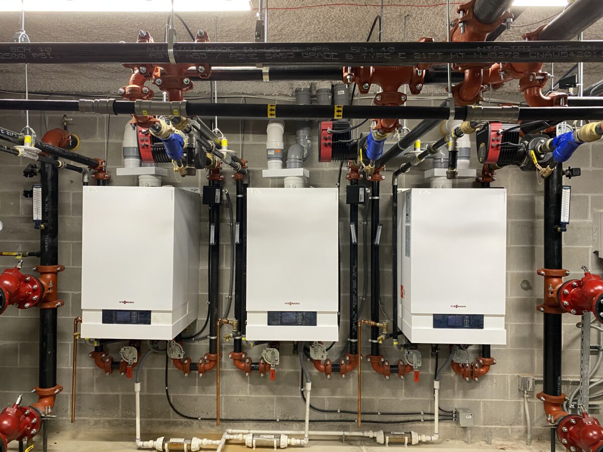 High efficiency boiler installation at passive house construction